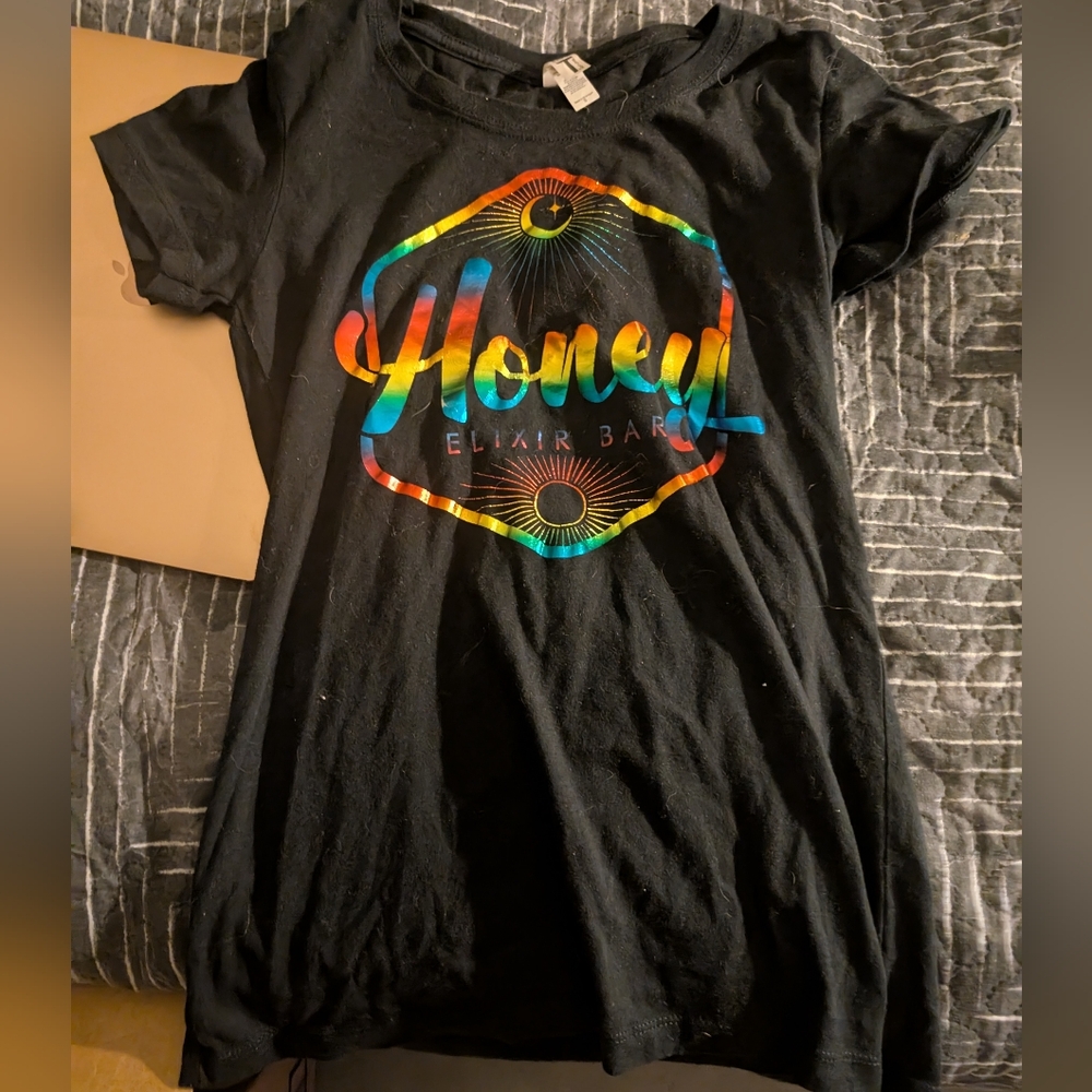 Honey Elixir Pride Black T-Shirt with Colorful Eye Design